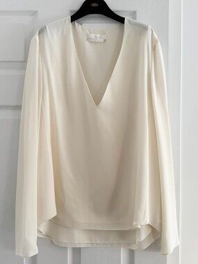 Chloe V neck Blouse in "Milk", size 40. Fits like a 6/8